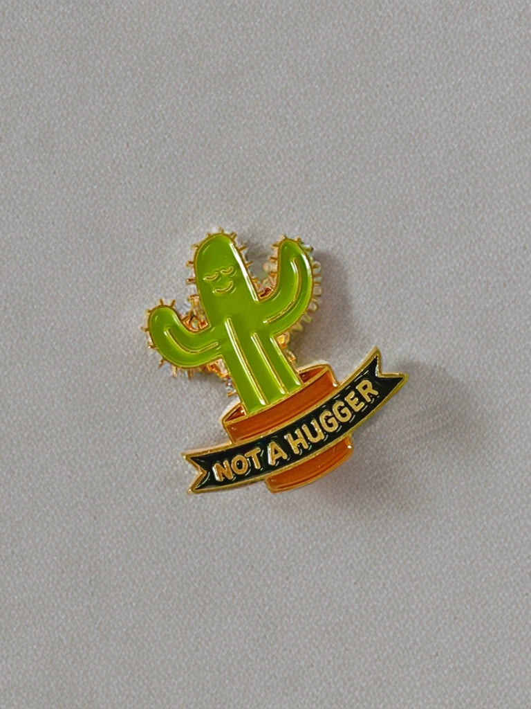 Enamel pin-not a hugger